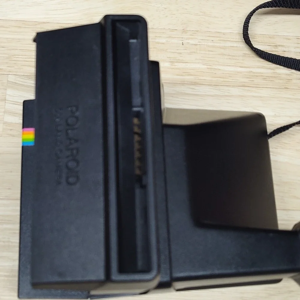 Polaroid please see